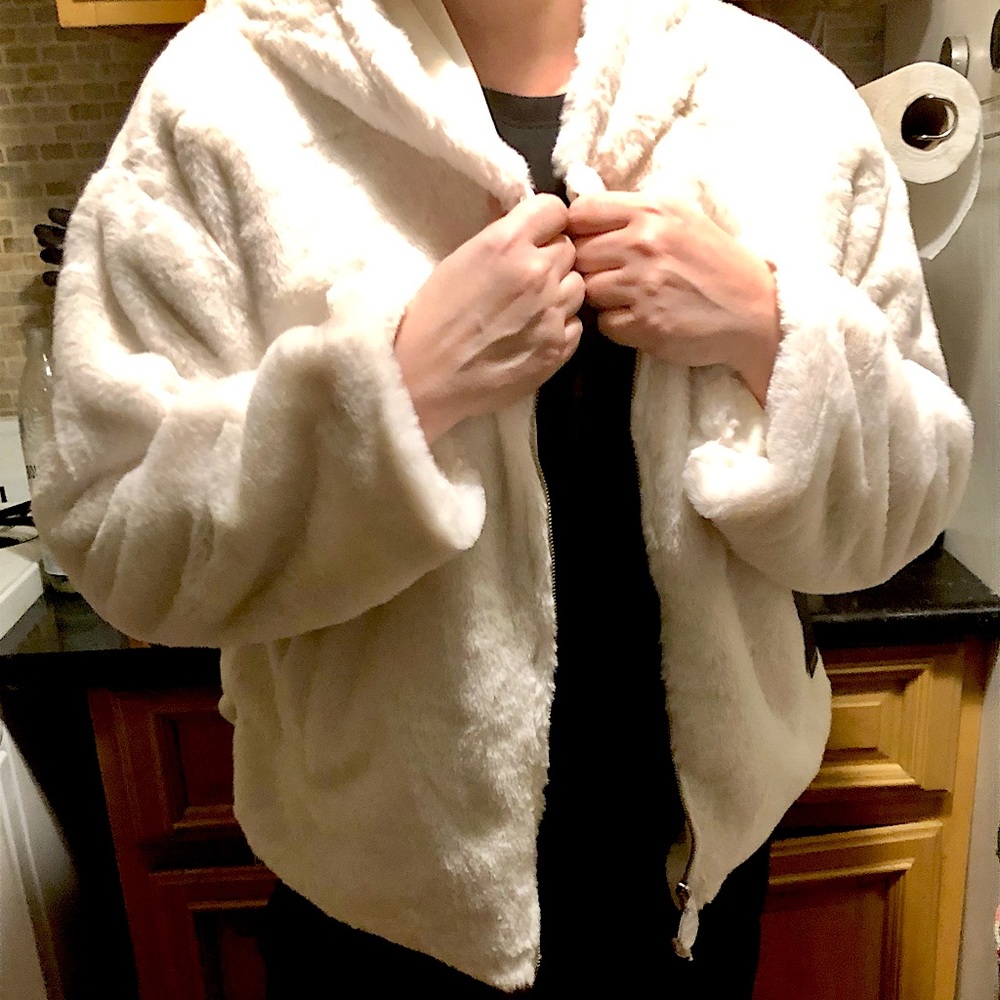 Faux fur white lined hooded jacket.